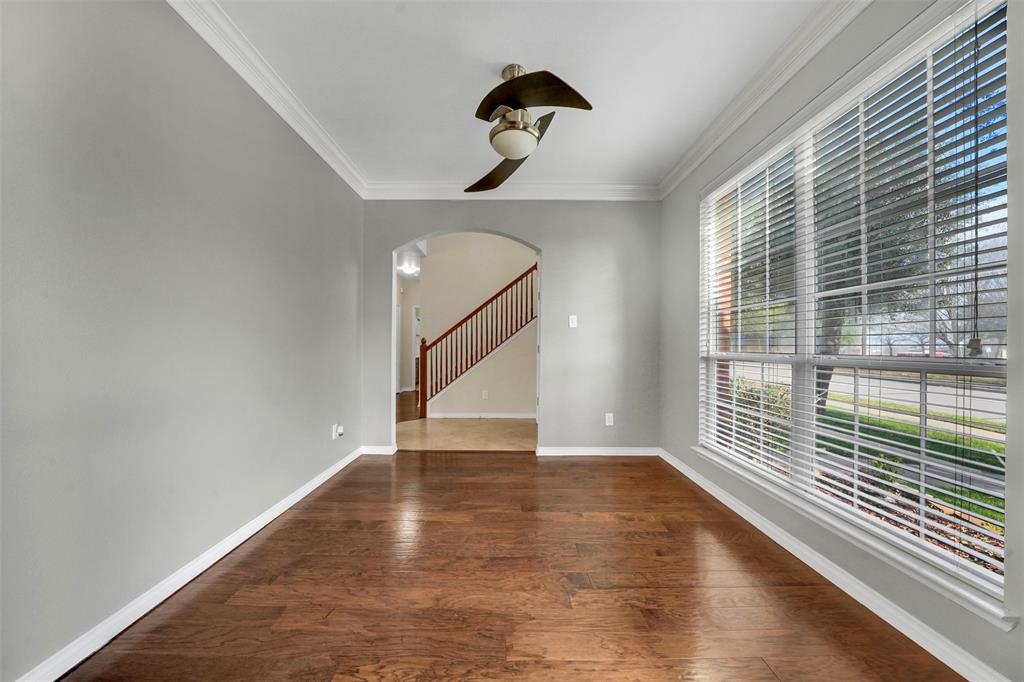 3305 Silver Springs Way Rowlett, TX 75089 - Photo 7 of 40 a view of empty room with wooden floor and fan