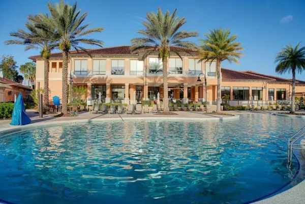 a front view of a building with lake view