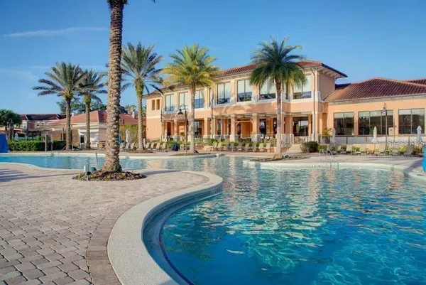 a front view of a house with swimming pool