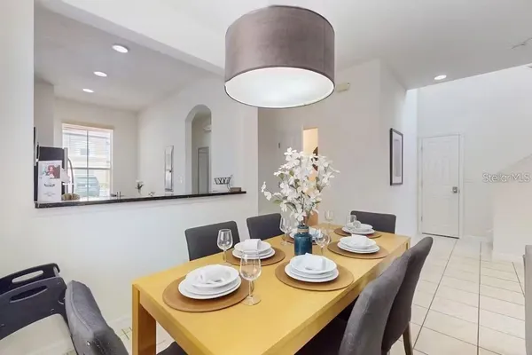 a view of a dining room with furniture