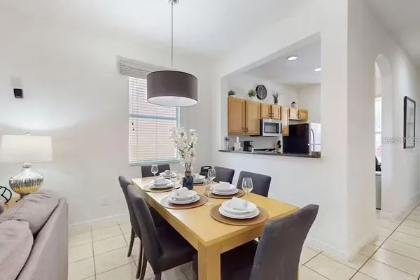 a view of a dining room with furniture
