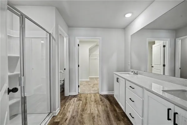 a bathroom with a bath tub and shower