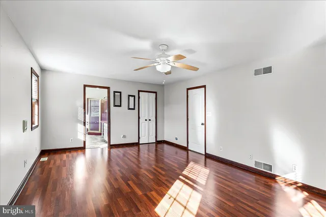 a view of entryway with wooden floor