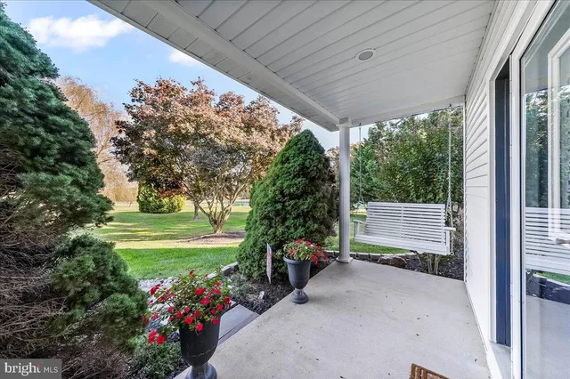 a aerial view of a house with a yard