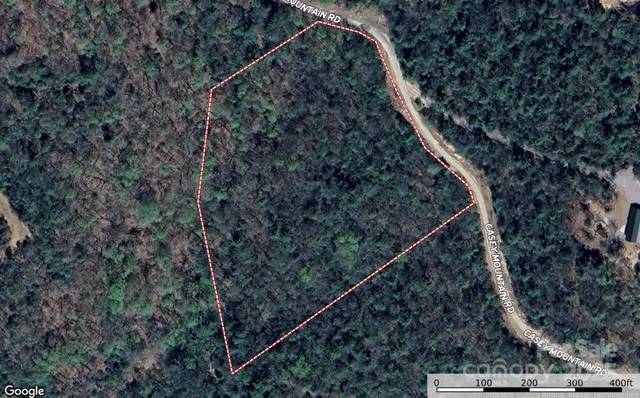 a view of a yard from a balcony