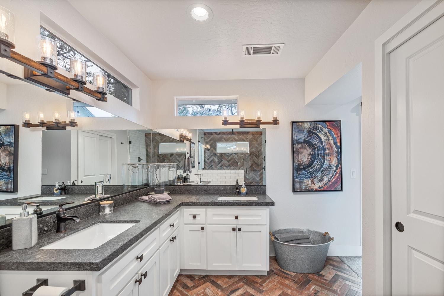 39253 Robin Bass Lake, CA 93604 - Photo 26 of 86 a spacious bathroom with a double vanity sink and a mirror