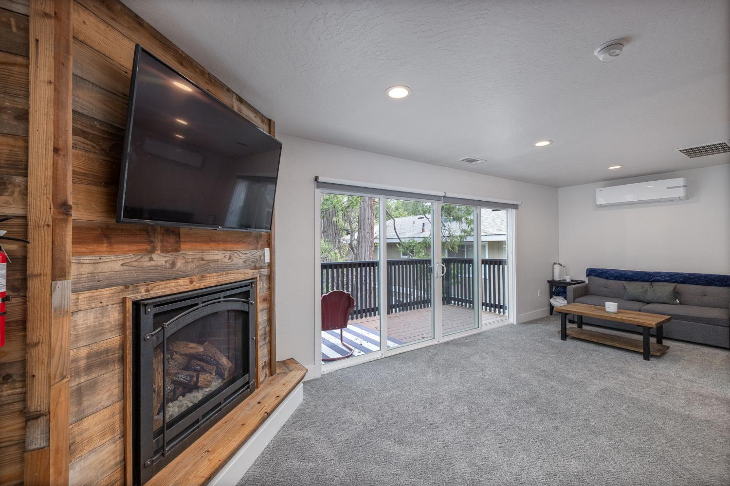 39253 Robin Bass Lake, CA 93604 - Photo 44 of 86 a living room with furniture and a fireplace