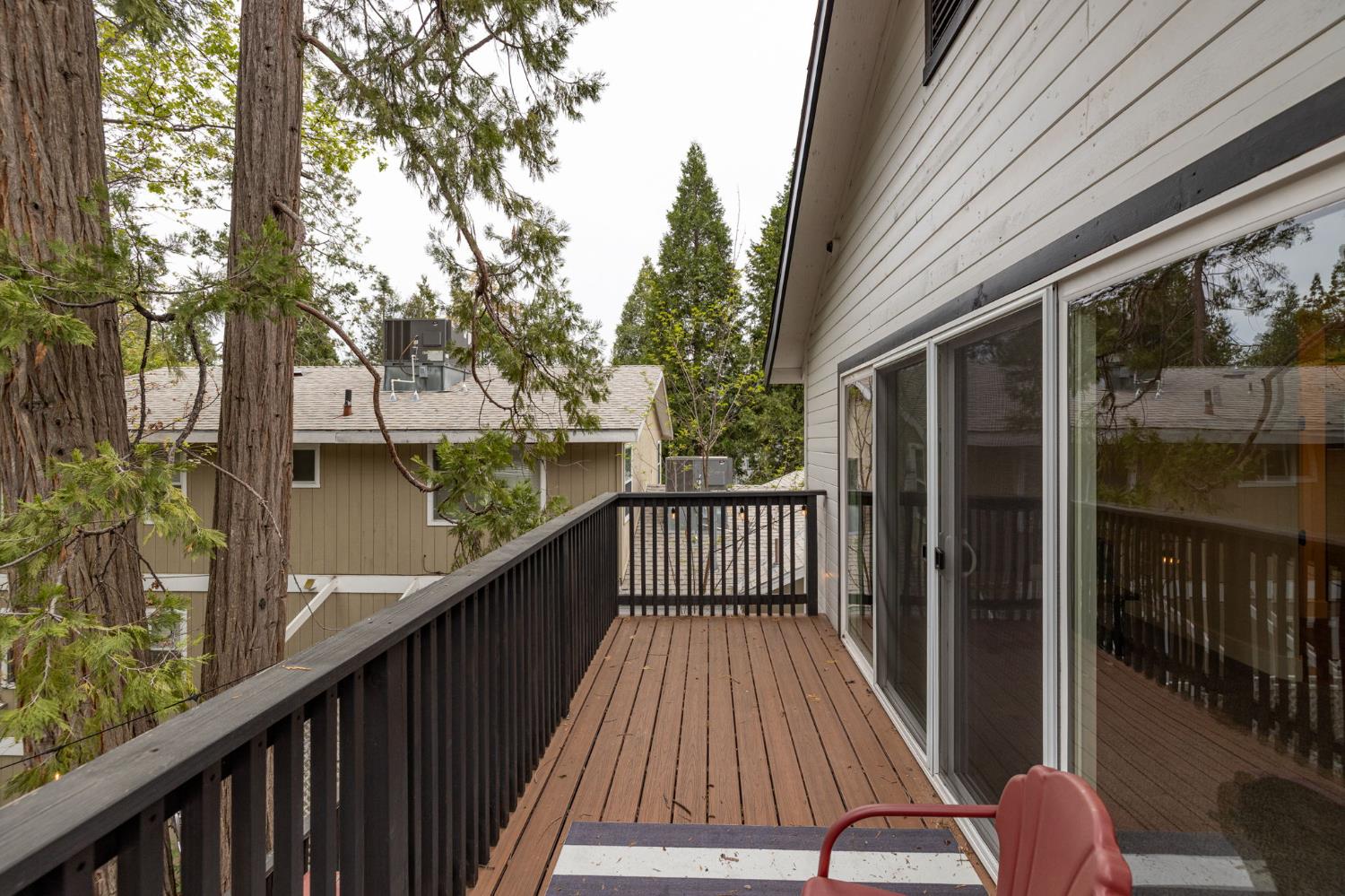 39253 Robin Bass Lake, CA 93604 - Photo 56 of 86 a view of balcony with wooden floor and fence