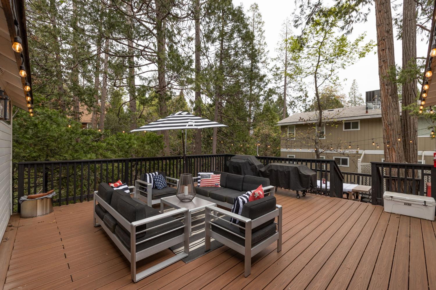 39253 Robin Bass Lake, CA 93604 - Photo 58 of 86 a view of a roof deck with couches and wooden floor