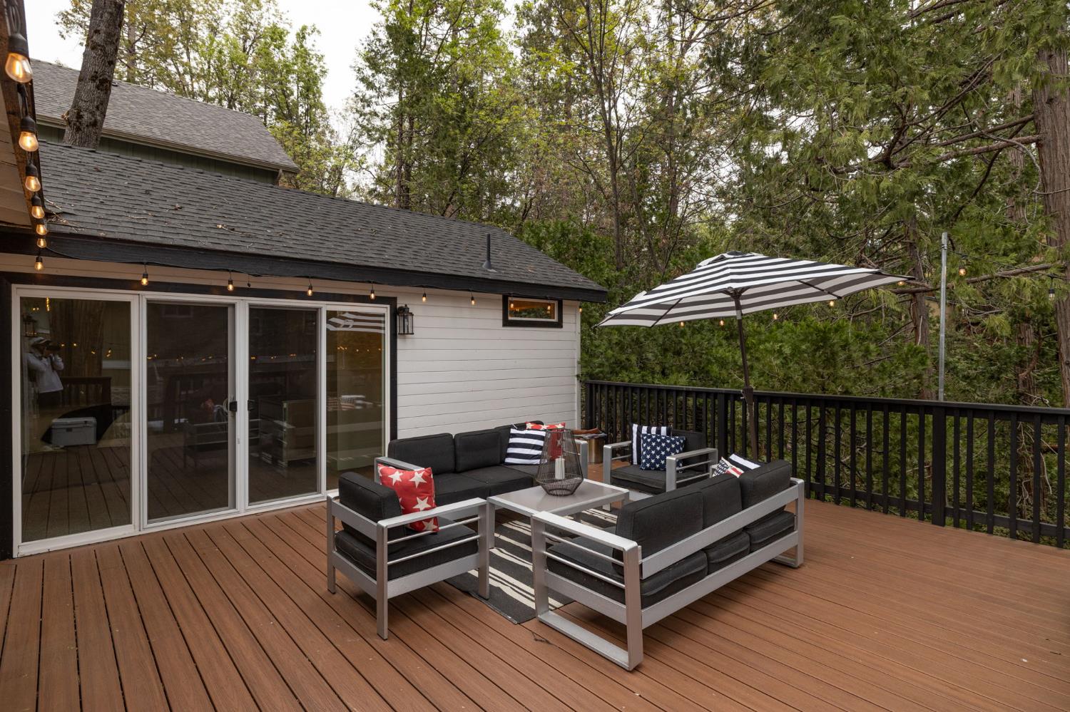 39253 Robin Bass Lake, CA 93604 - Photo 61 of 86 a view of a roof deck with couches and wooden floor