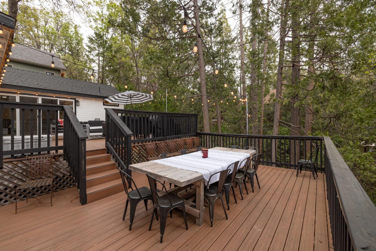 39253 Robin Bass Lake, CA 93604 - Photo 72 of 86 a view of backyard with hardwood and deck