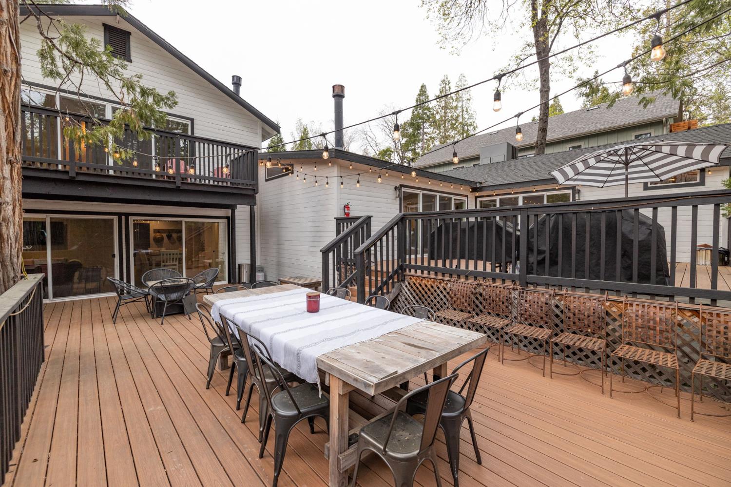 39253 Robin Bass Lake, CA 93604 - Photo 73 of 86 a dinning table and chairs in front of a house