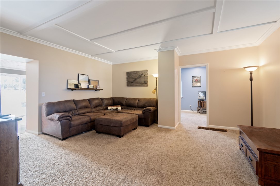 4244 Pearsall Road Williamson, NY 14589 - Photo 15 of 45 The living room - plenty of space for all!