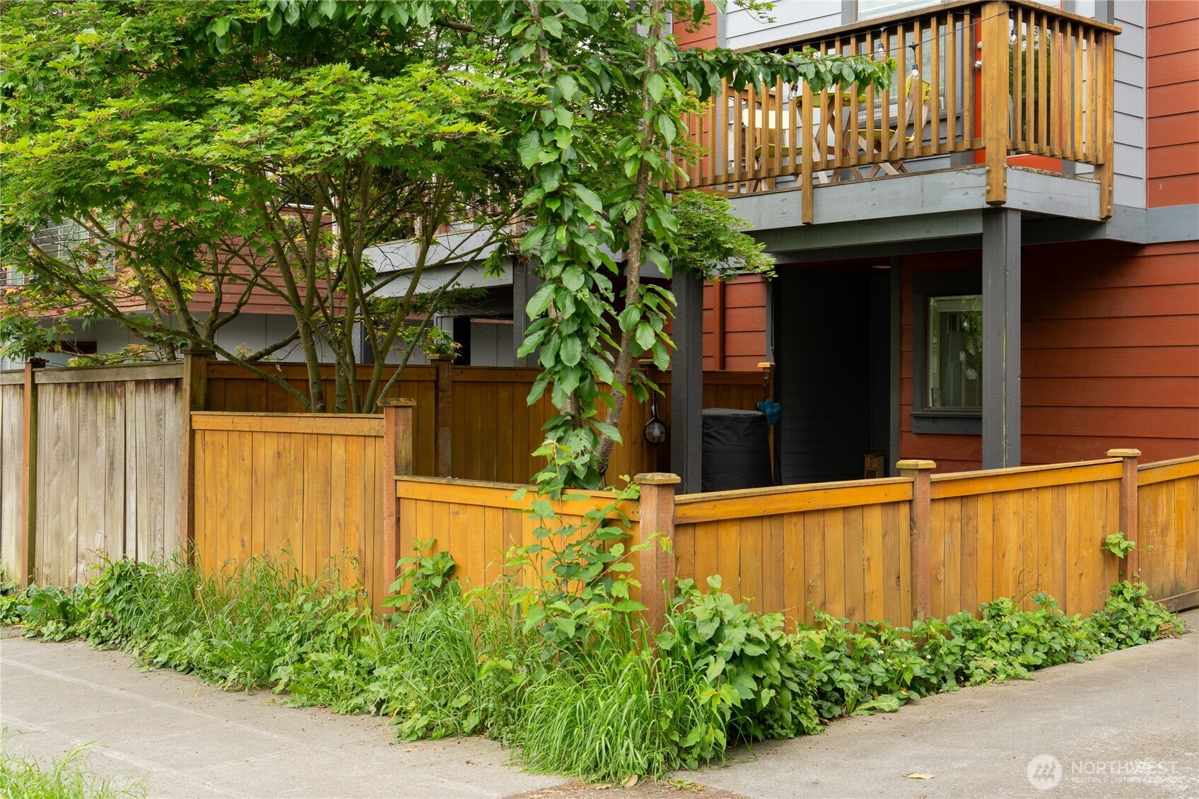 1419 Northwest 65th Street, Unit B Seattle, WA 98117 - Photo 5 of 26 front view of a house with a small yard