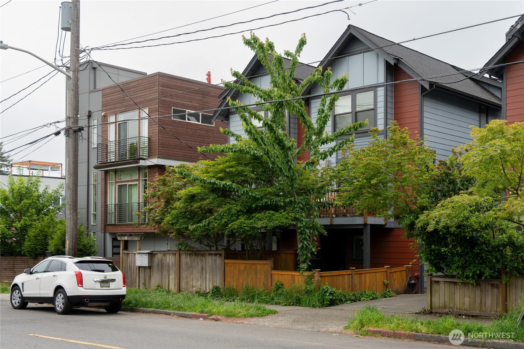 1419 Northwest 65th Street, Unit B Seattle, WA 98117 - Photo 6 of 26 a car parked in front of a house
