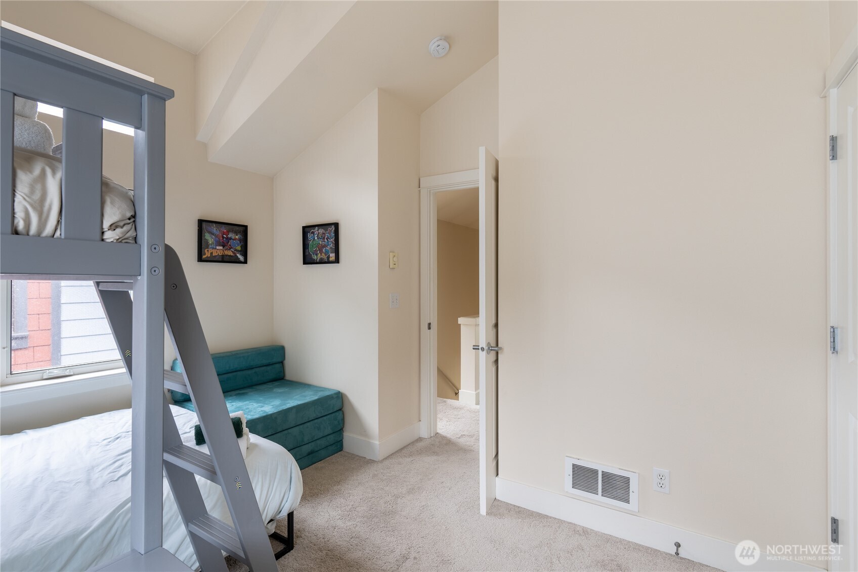 1419 Northwest 65th Street, Unit B Seattle, WA 98117 - Photo 8 of 26 a room with furniture and a window