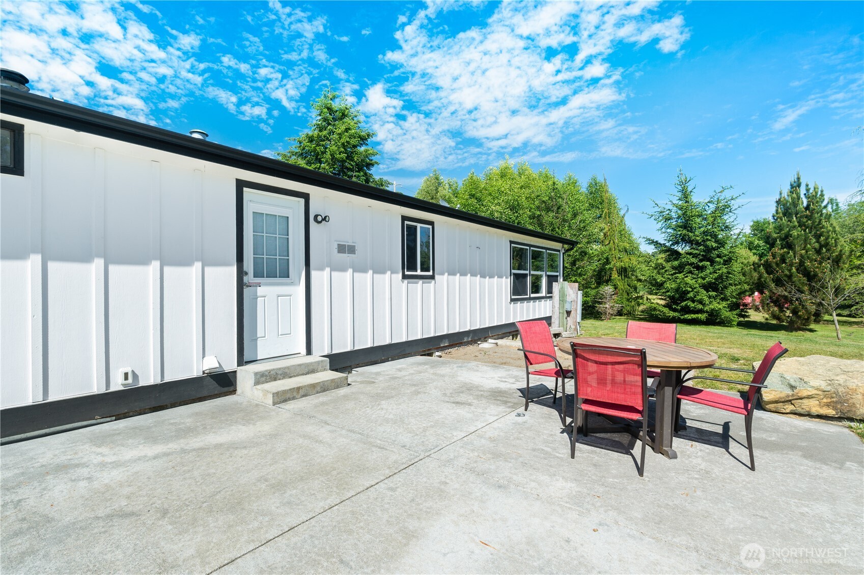3471 Birch Bay Lynden Road Custer, WA 98240 - Photo 24 of 38 a backyard of a house with outdoor seating