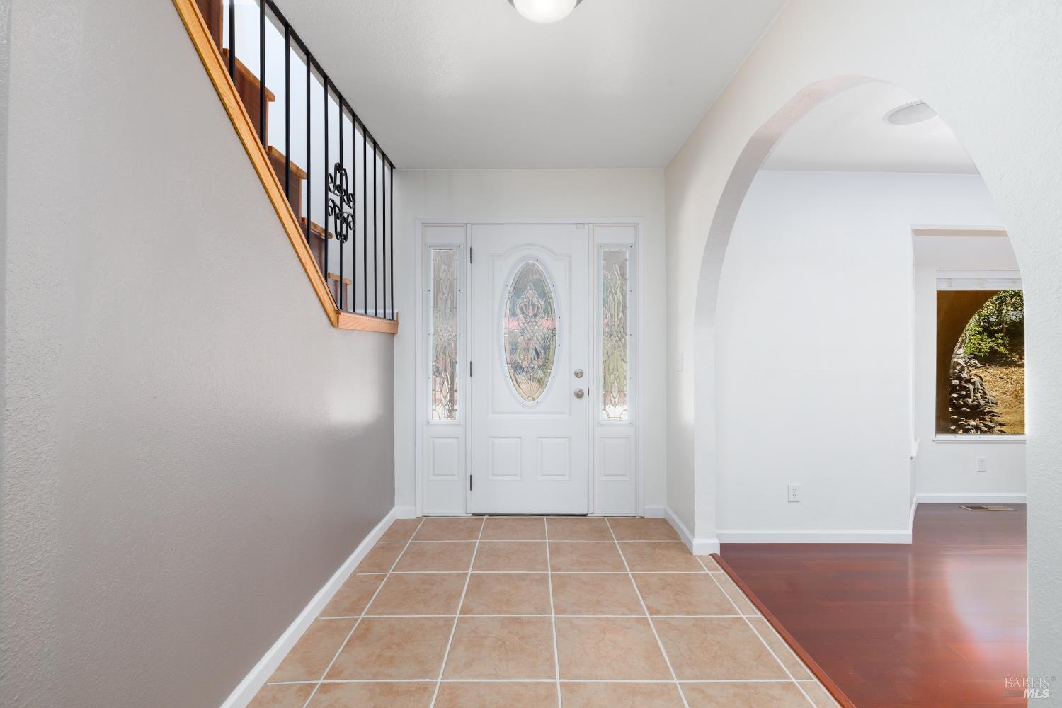 1088 Palomino Road Cloverdale, CA 95425 - Photo 21 of 41 a view of a hallway with wooden floor and staircase