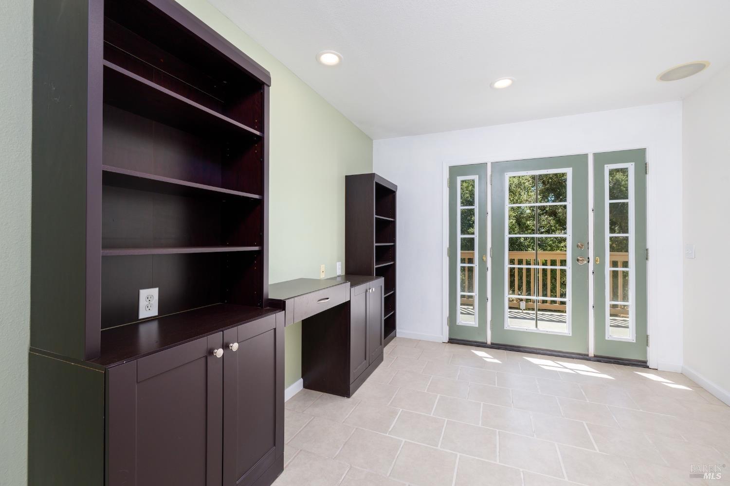 1088 Palomino Road Cloverdale, CA 95425 - Photo 28 of 41 a view of an empty room with a kitchen