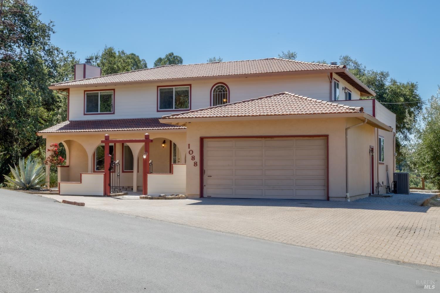1088 Palomino Road Cloverdale, CA 95425 - Photo 5 of 41 a front view of a house with a garage