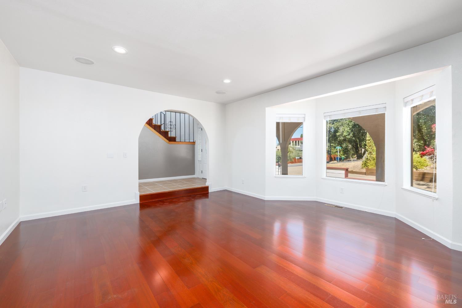 1088 Palomino Road Cloverdale, CA 95425 - Photo 10 of 41 a view of an empty room with wooden floor and a window