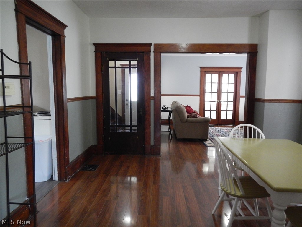 355 South 9th Street Coshocton, OH 43812 - Photo 7 of 35 dining room looking into living room, front entrance to the left and the kitchen on the side left, study is to the right off the dining