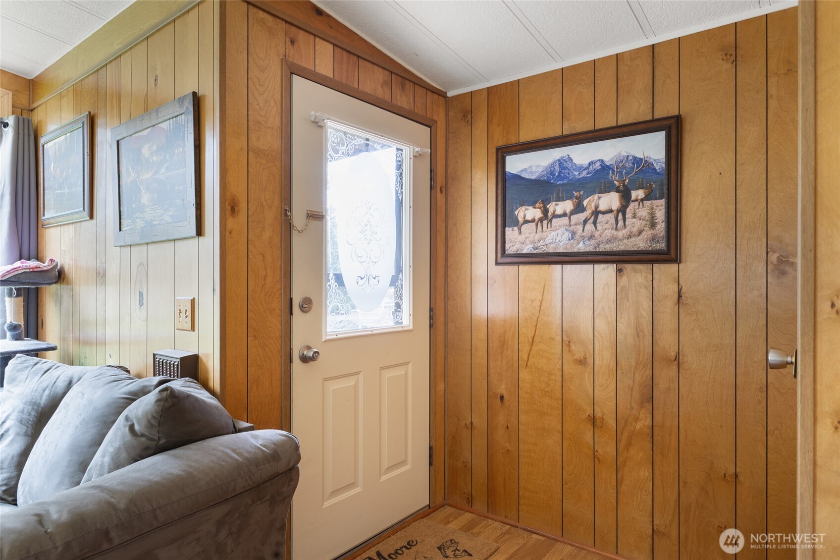 7472 Rd F Southeast, Unit 8 Othello, WA 99344 - Photo 3 of 40 a living room with furniture and a gate