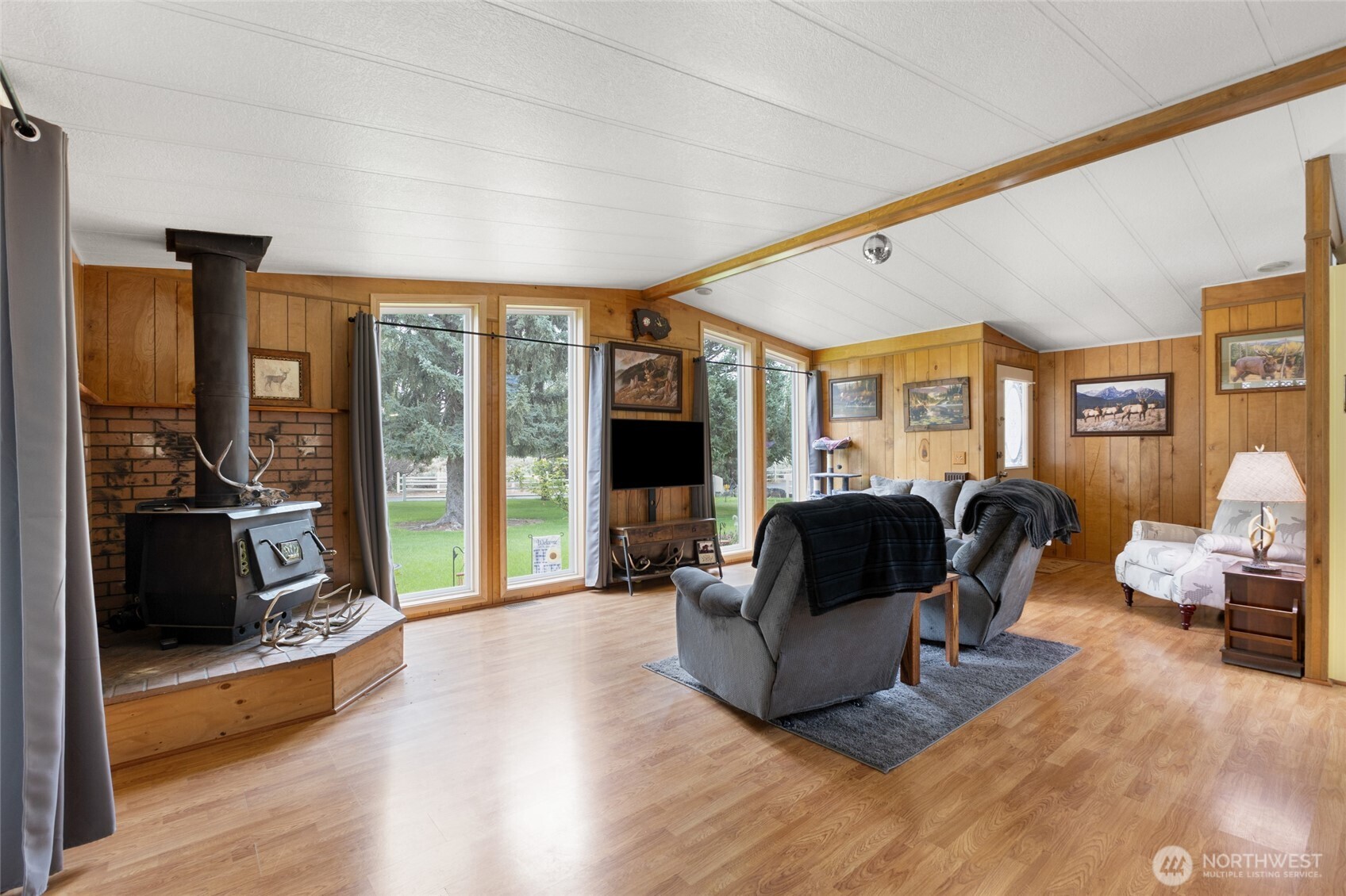 7472 Rd F Southeast, Unit 8 Othello, WA 99344 - Photo 7 of 40 a living room with furniture fireplace and a large window