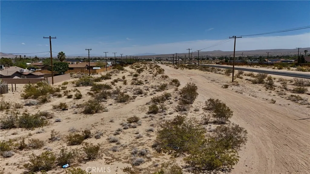 744 West Bowman Road Ridgecrest, CA 93555 - Photo 8 of 9 Red boundary lines on pictures are an estimate and for marketing purposes only. Buyer to verify all aspects of this property including, but not limited to utilities, assessments, boundaries, usage, access, and zoning to satisfy themselves.