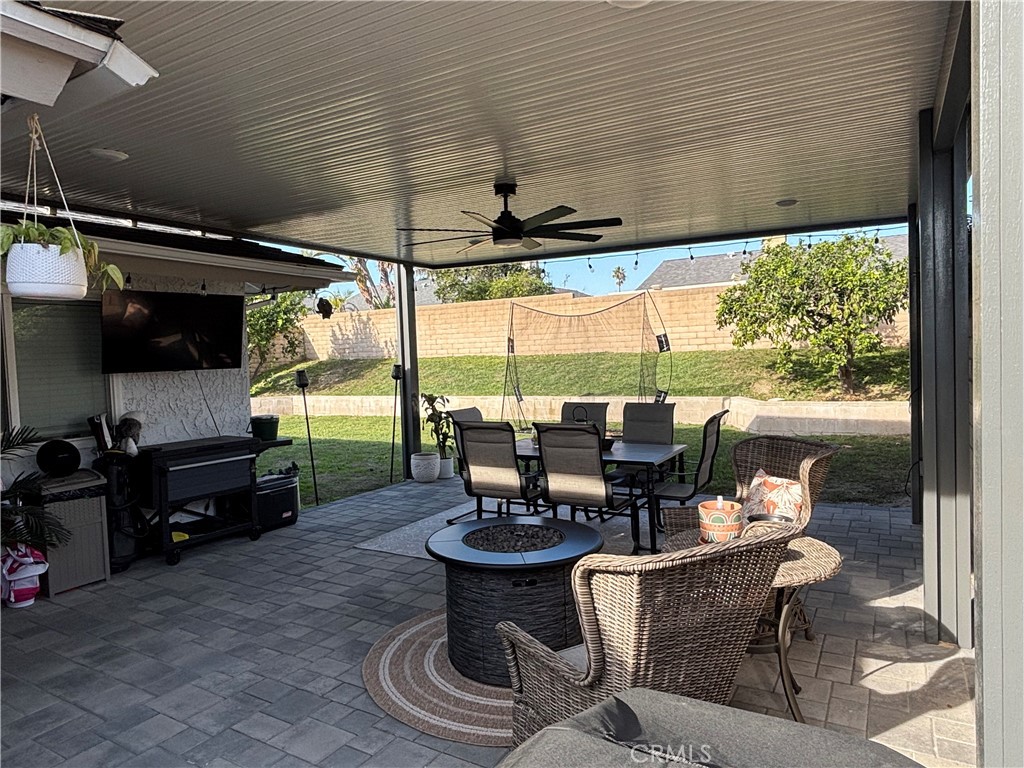 6450 Arthur Street Chino, CA 91710 - Photo 7 of 16 a dining room with furniture and a floor to ceiling window