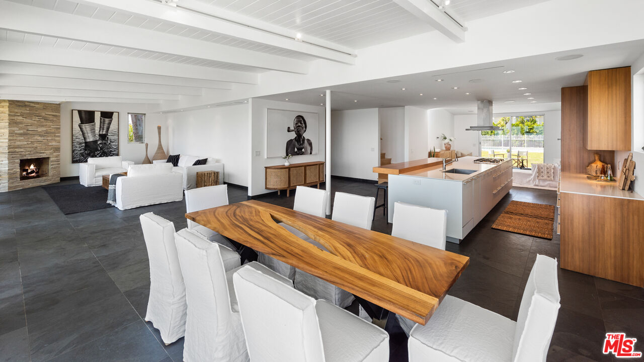 3431 Coast View Drive Malibu, CA 90265 - Photo 16 of 49 a living room with furniture and wooden floor