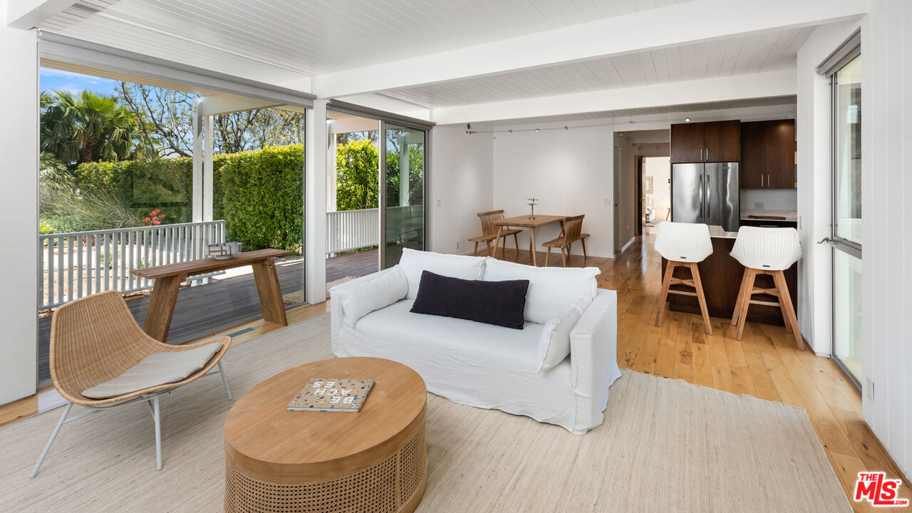 3431 Coast View Drive Malibu, CA 90265 - Photo 41 of 49 a living room with furniture and a large window