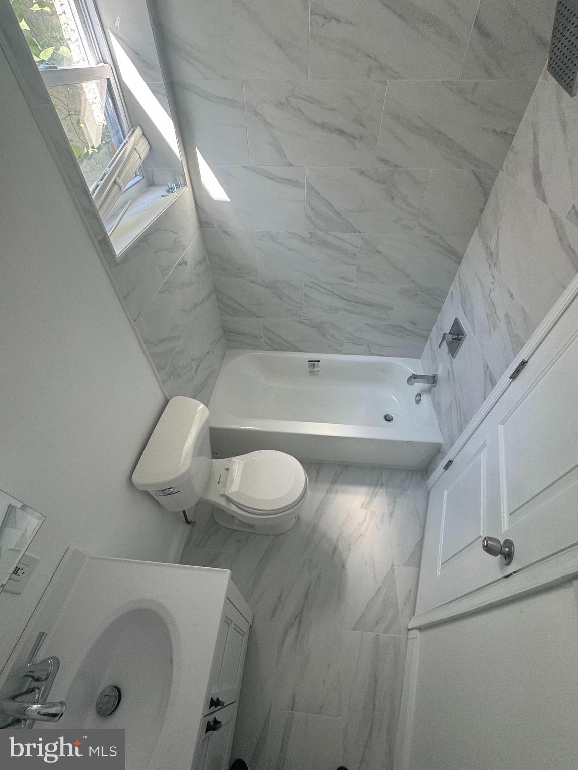 1722 South Taylor Street Philadelphia, PA 19145 - Photo 8 of 15 a bathroom with a sink a toilet and shower