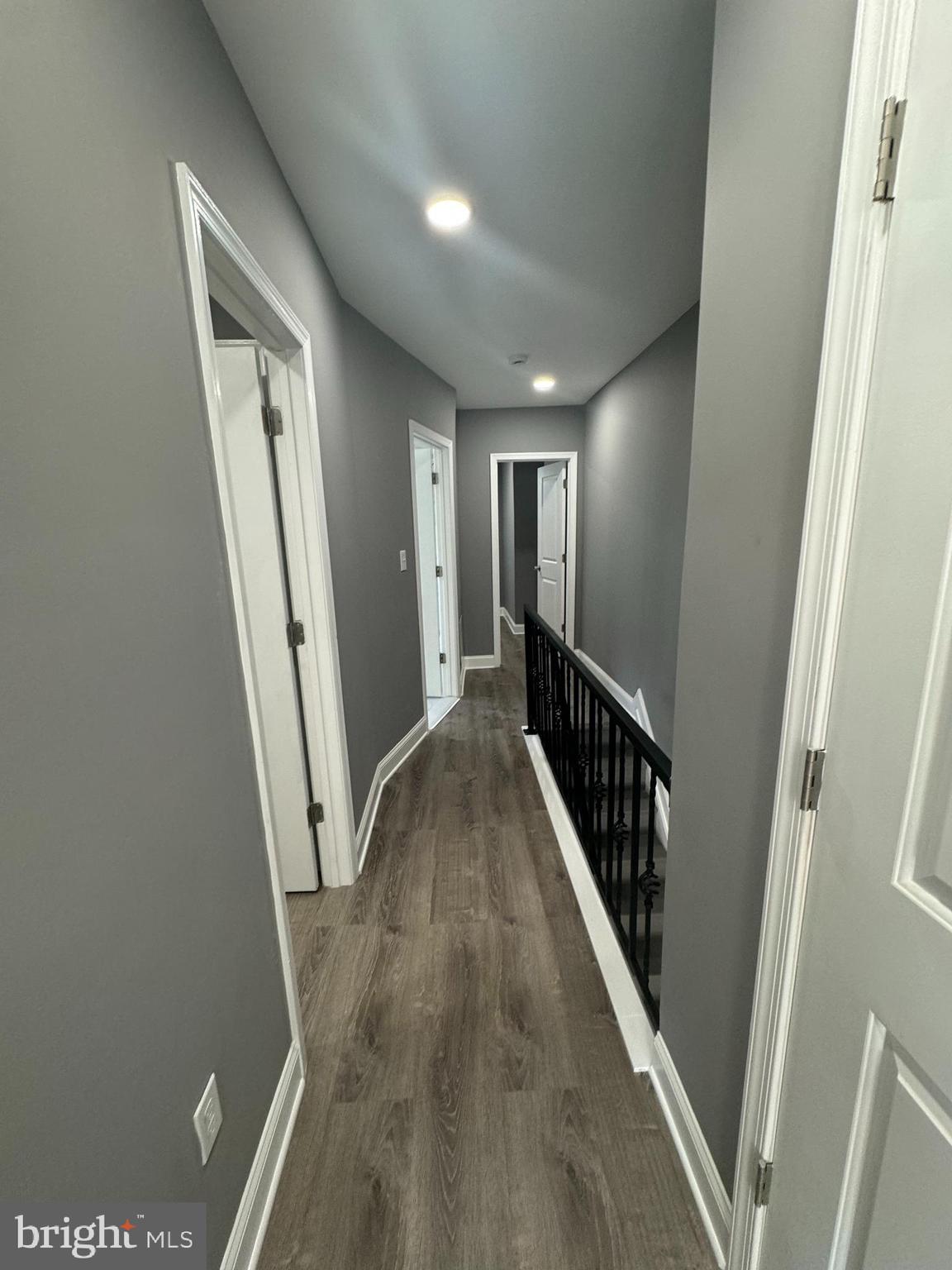 1722 South Taylor Street Philadelphia, PA 19145 - Photo 10 of 15 a view of a hallway with wooden floor and stairs
