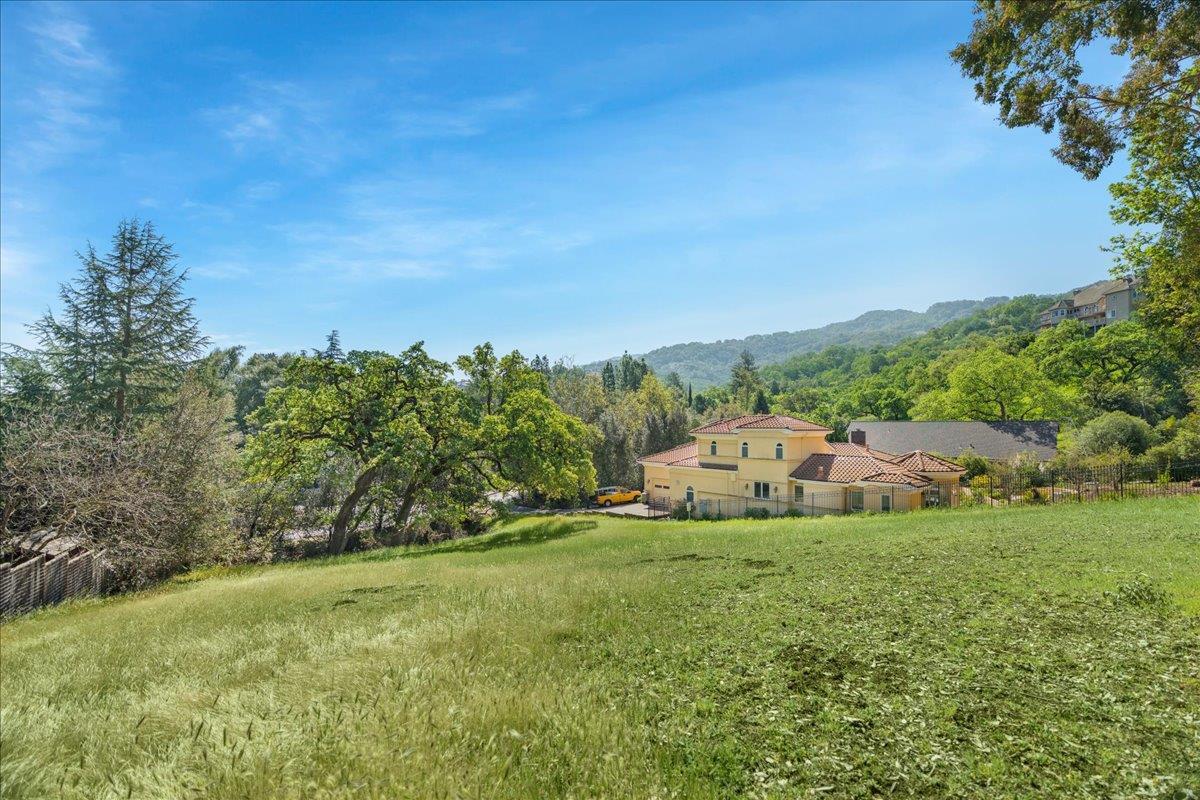 0 Echo Loop San Jose, CA 95120 - Photo 17 of 26 a view of a big yard with large trees