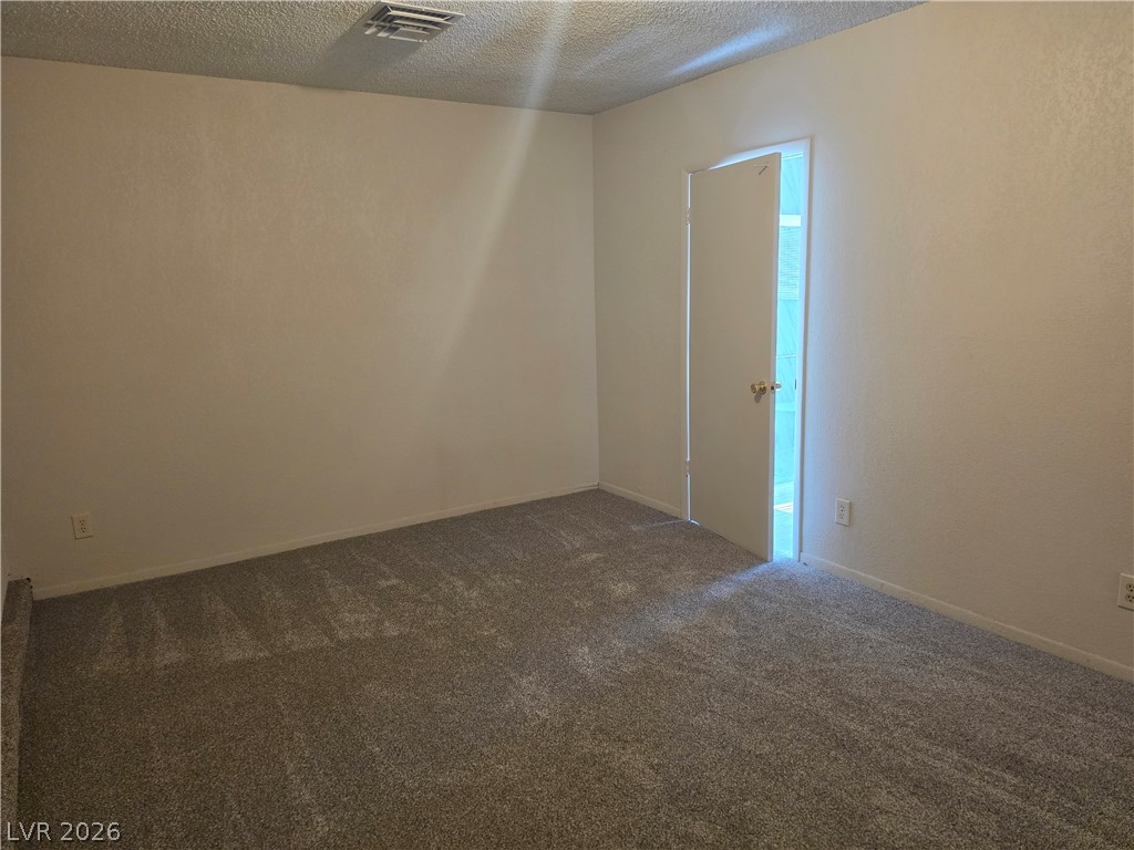 5289 Reeder Circle Las Vegas, NV 89119 - Photo 30 of 40 Soft carpeting underfoot defines this versatile bedroom space.