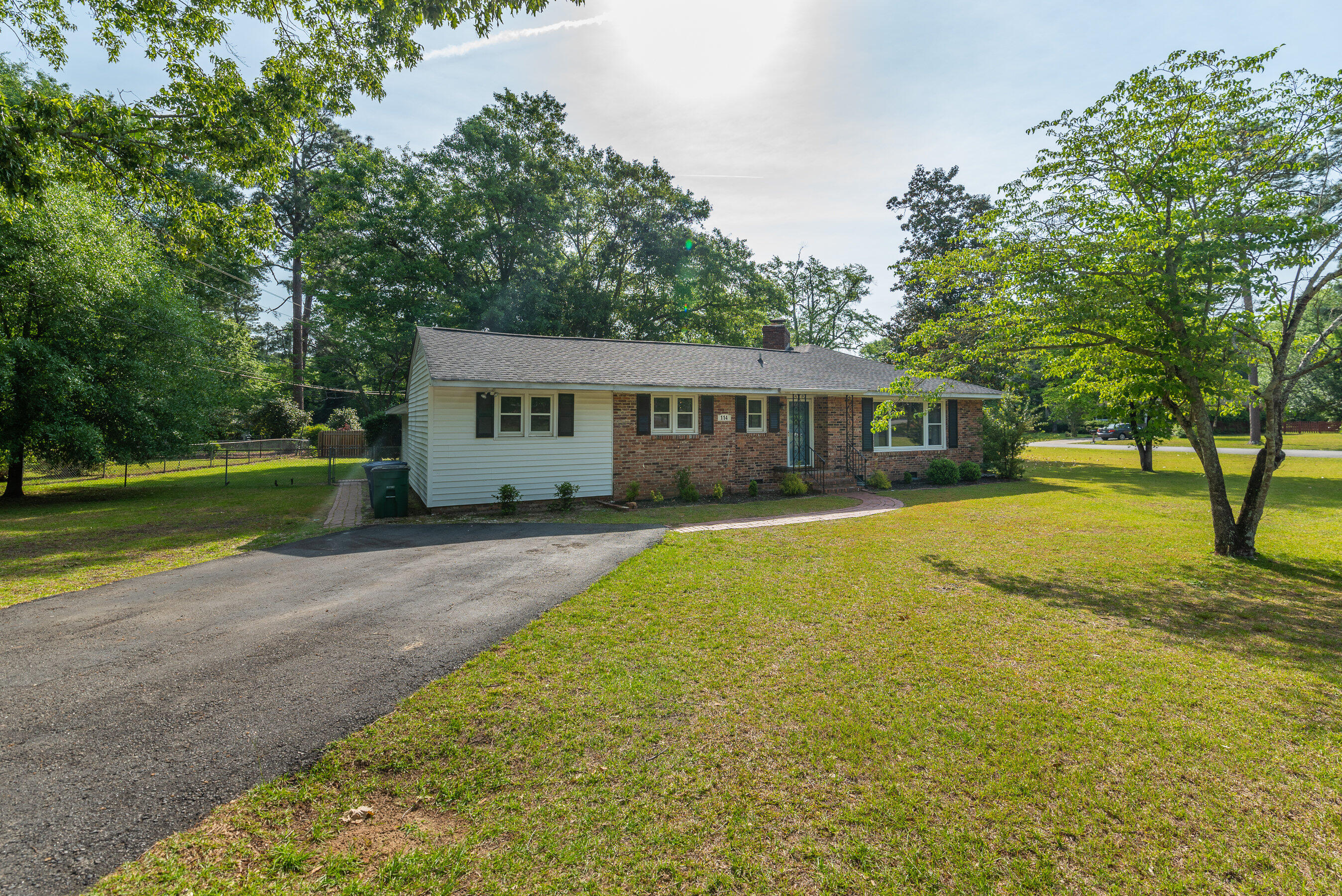 114 Gyles Road Southwest Aiken, SC 29803 - Photo 4 of 35 a view of a house with a yard patio and a tree
