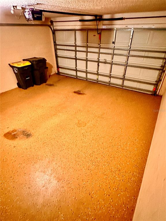 639 Cheshire Way Davenport, FL 33897 - Photo 15 of 15 a view of a room with racks on the wall