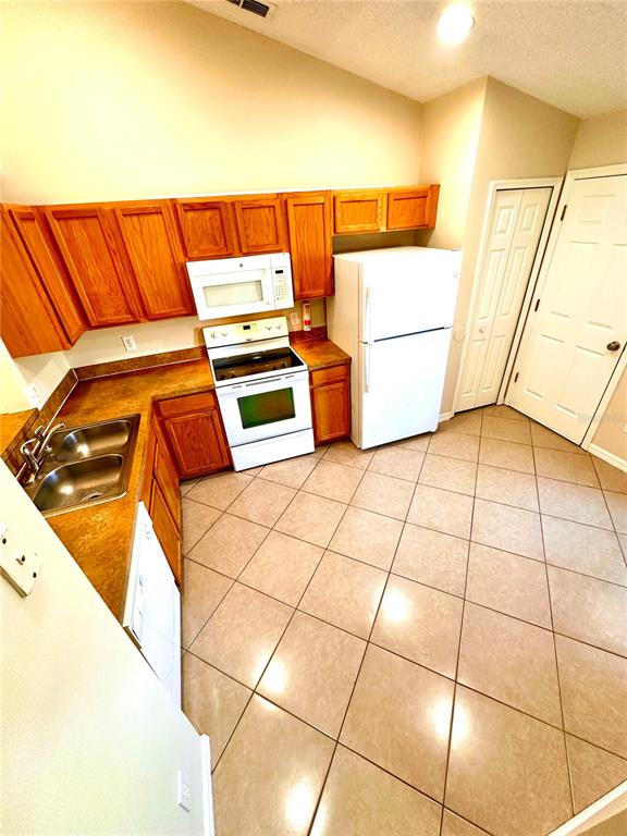 639 Cheshire Way Davenport, FL 33897 - Photo 3 of 15 a view of a storage & utility room