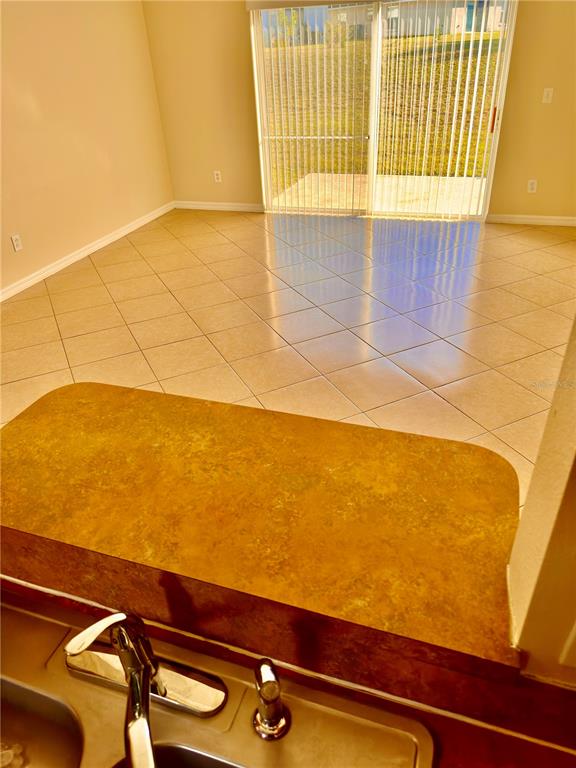 639 Cheshire Way Davenport, FL 33897 - Photo 4 of 15 a view of a room with wooden floor