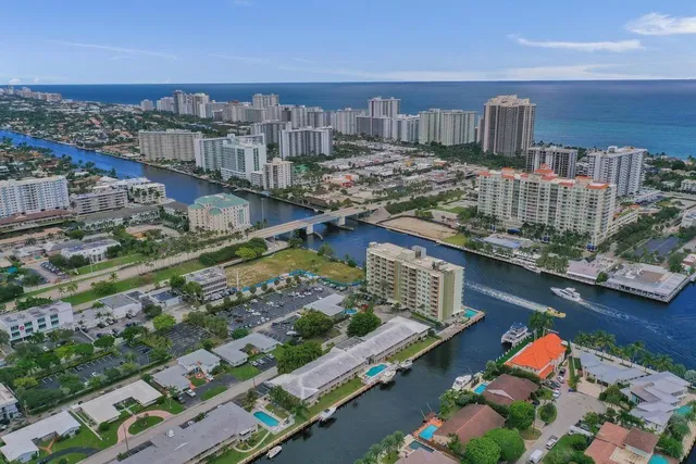 an aerial view of a house with a ocean view