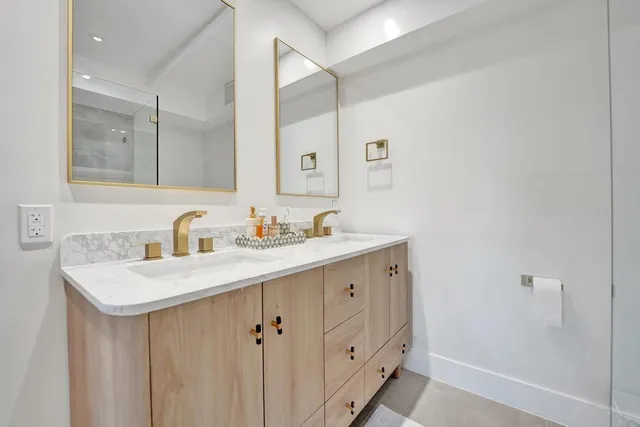 a bathroom with a shower and a toilet