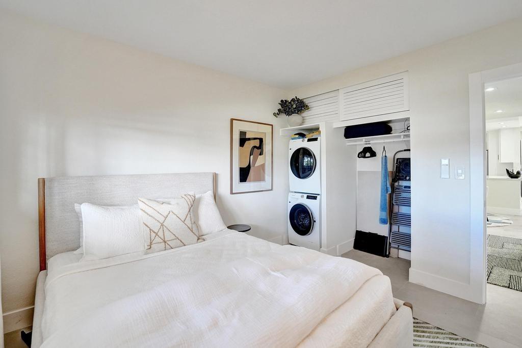 2866 Northeast 30th Street, Unit 9 Fort Lauderdale, FL 33306 - Photo 31 of 54 a large white bed in a white room