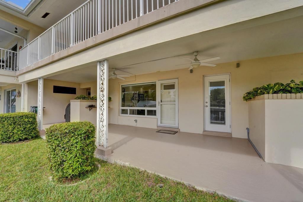 2866 Northeast 30th Street, Unit 9 Fort Lauderdale, FL 33306 - Photo 35 of 54 a view of a porch with seating space
