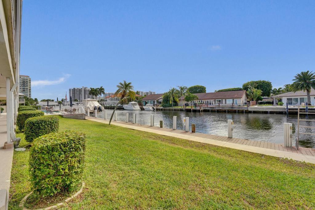 2866 Northeast 30th Street, Unit 9 Fort Lauderdale, FL 33306 - Photo 38 of 54 a view of a lake with houses with outdoor space