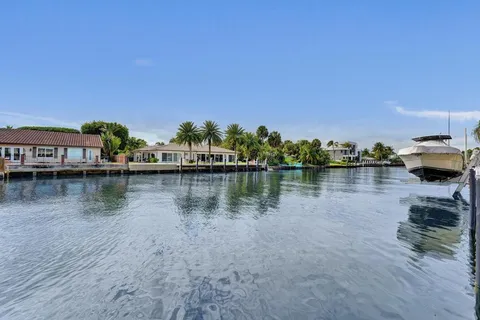 a view of a house with a swimming pool