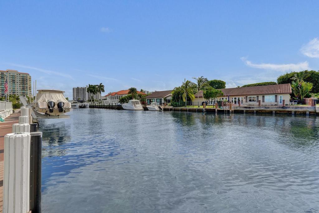 2866 Northeast 30th Street, Unit 9 Fort Lauderdale, FL 33306 - Photo 45 of 54 a view of a lake with houses