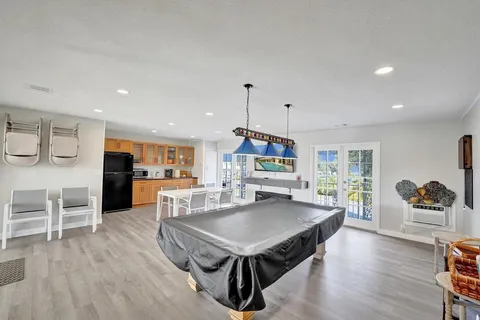a view of an empty room with glass door