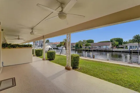 a view of a lake with a house