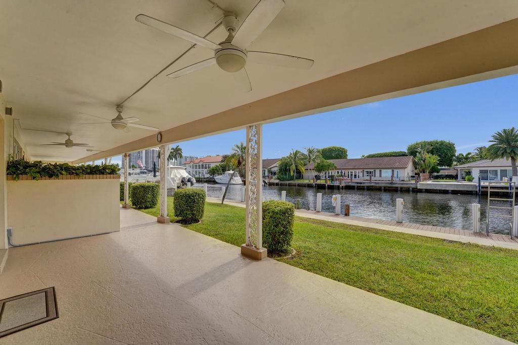 2866 Northeast 30th Street, Unit 9 Fort Lauderdale, FL 33306 - Photo 5 of 54 a view of a lake with a house